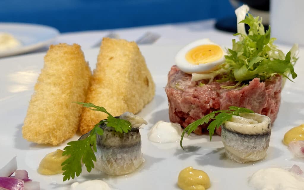 Classic Steak Tartare with Quail Egg & White Anchovy.