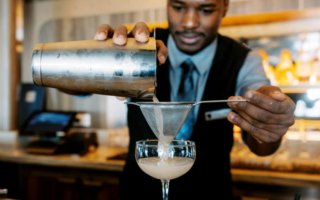 A Seabourn barman making a zero-proof cocktail.