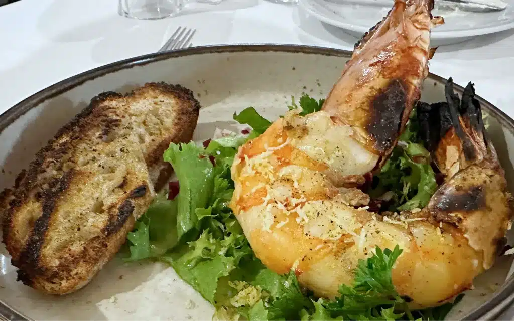 Grilled Jumbo Shrimp with Parsley Salad, Lemon Zest & Roasted Sourdough Bread.