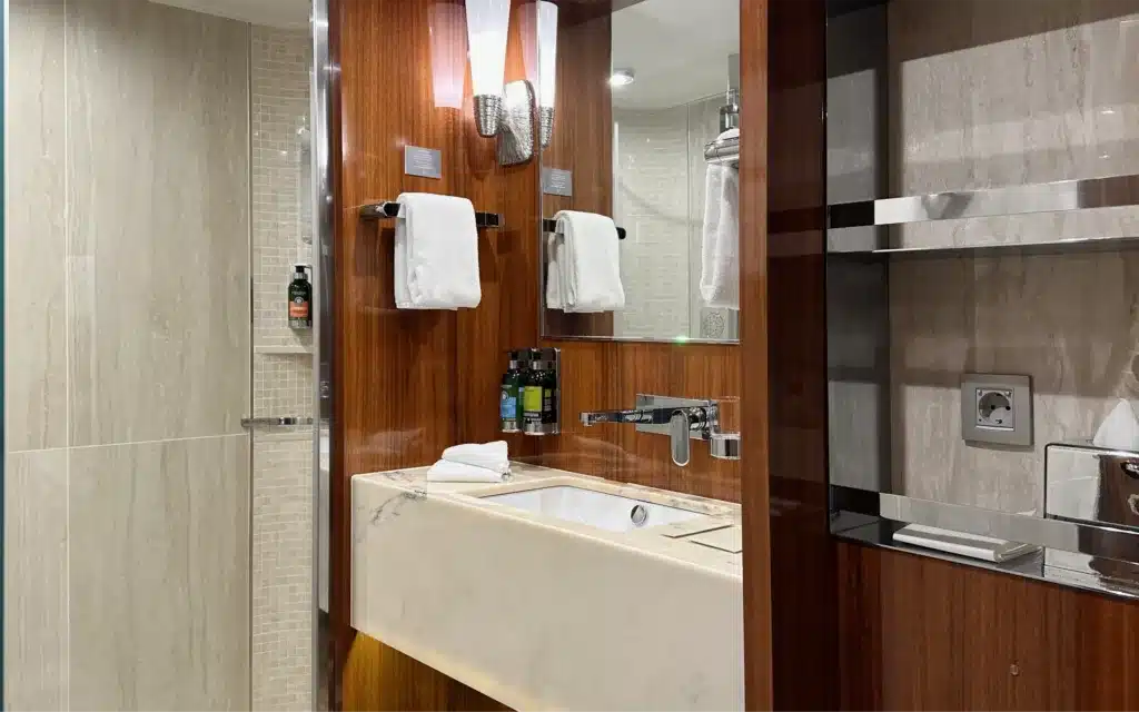 The bathroom in a World Traveller Horizon Stateroom.