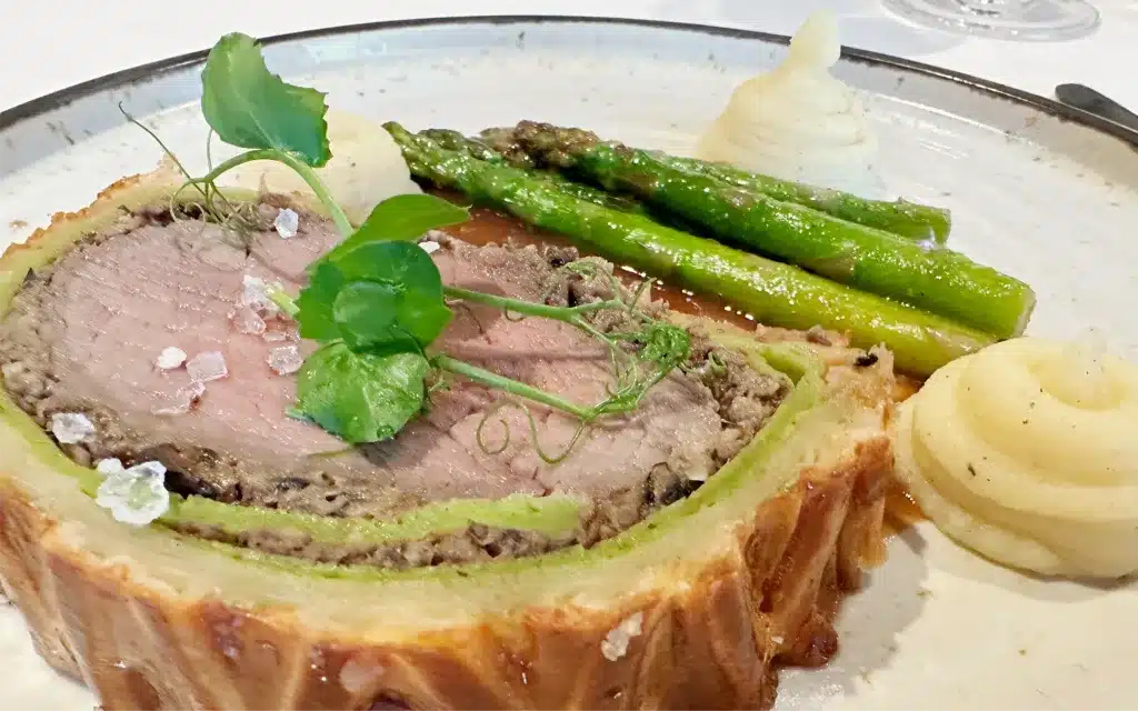 Beef Wellington with Truffle Mushrooms, Asparagus & Truffle Sauce.