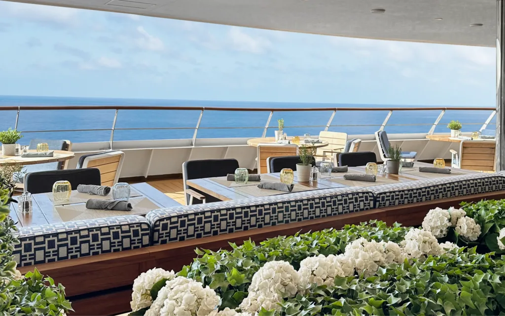 A view out to the ocean from a terrace restaurant onboard the World Traveller cruise ship.